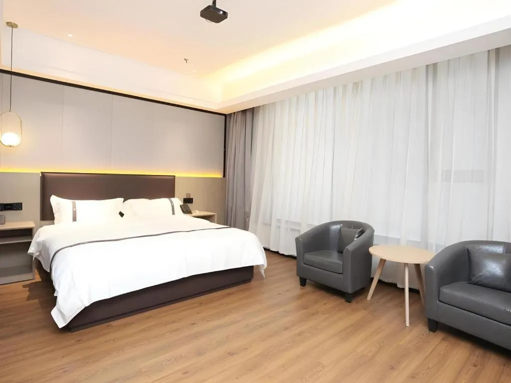Bed in Gya Hotel Beijing Shunyi Yanjing Bridge