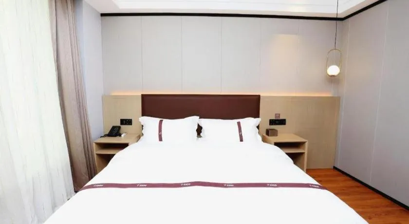 Bed in Gya Hotel Beijing Shunyi Yanjing Bridge