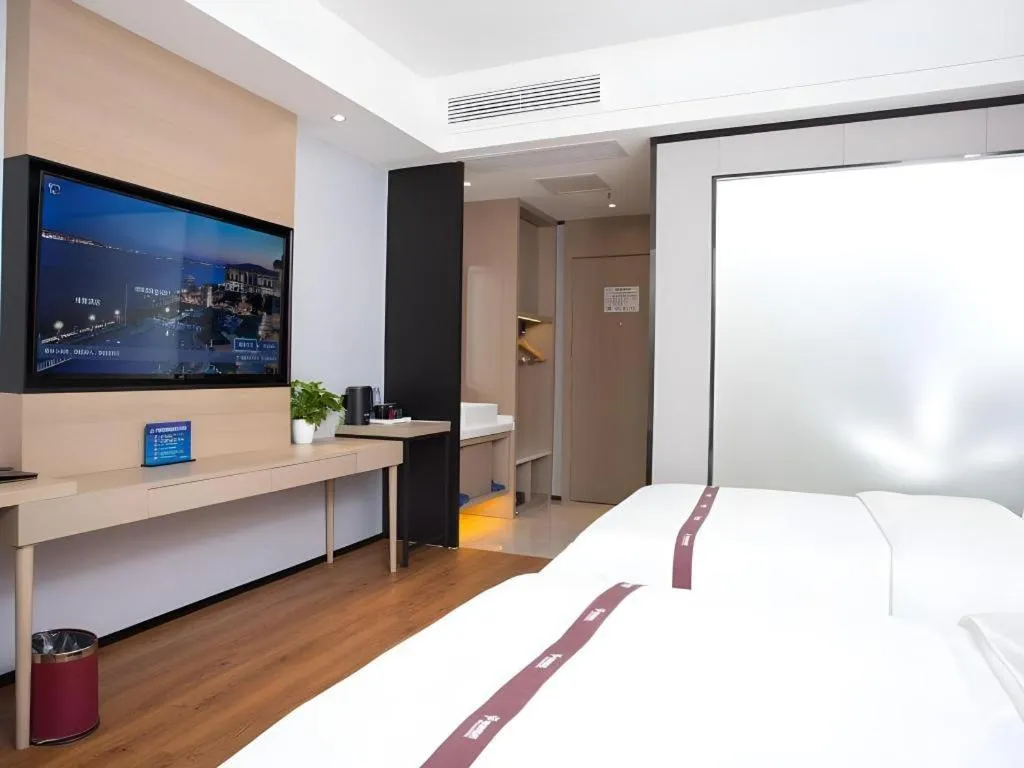 Bed in Gya Hotel Beijing Shunyi Yanjing Bridge