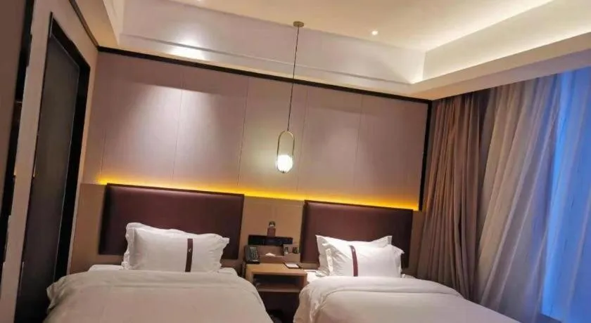 Bed in Gya Hotel Beijing Shunyi Yanjing Bridge