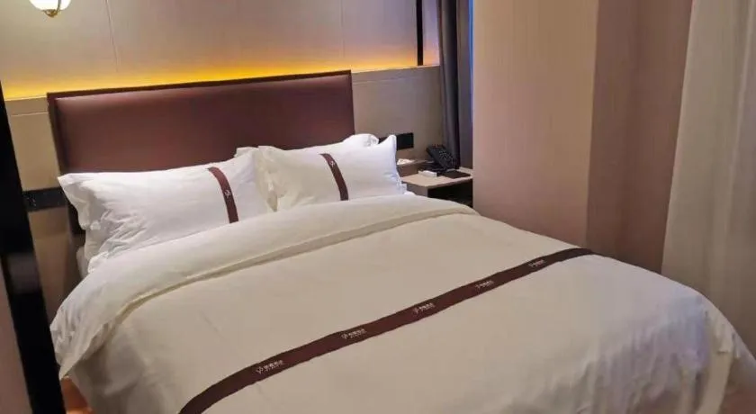 Bed in Gya Hotel Beijing Shunyi Yanjing Bridge