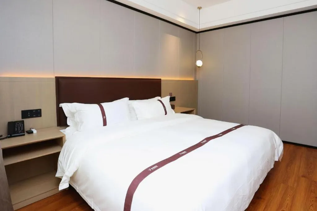 Bed in Gya Hotel Beijing Shunyi Yanjing Bridge