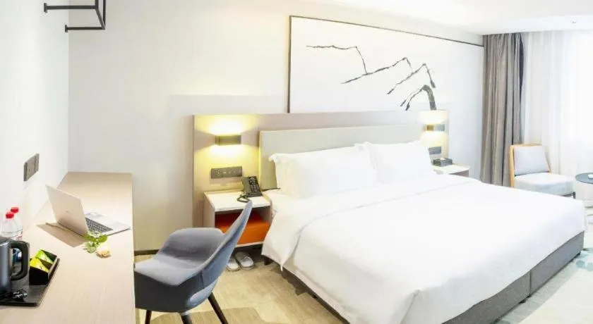 Bed in GreenTree Eastern Chongqing Yangjiaping Pedestrian Street Mixc Hotel