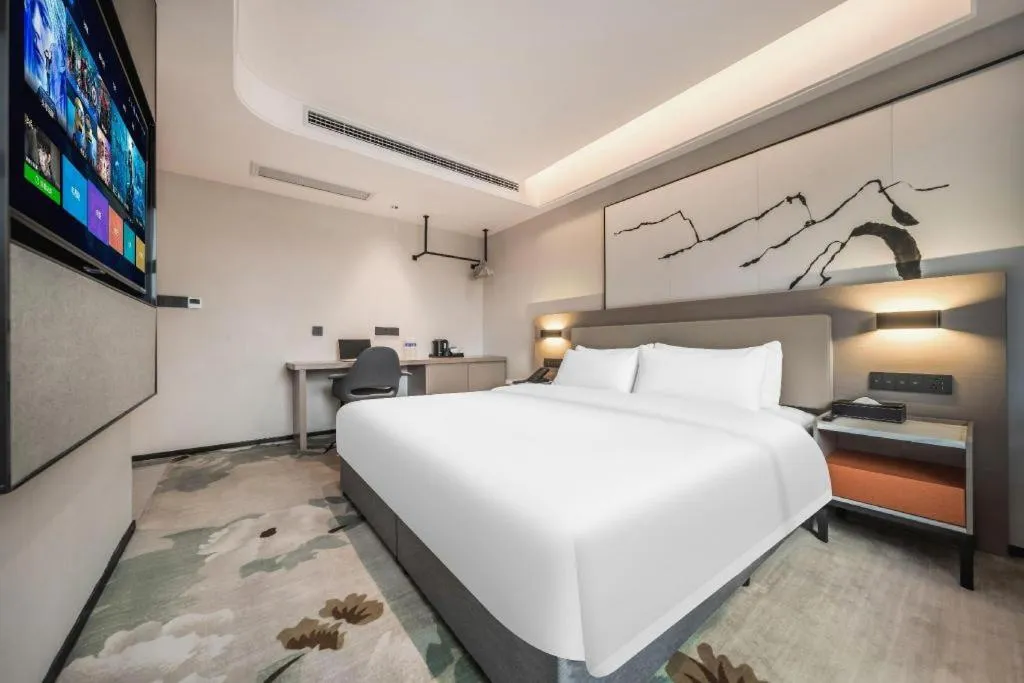 Bed in GreenTree Eastern Chongqing Yangjiaping Pedestrian Street Mixc Hotel