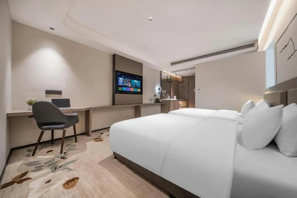 Bed in GreenTree Eastern Chongqing Yangjiaping Pedestrian Street Mixc Hotel