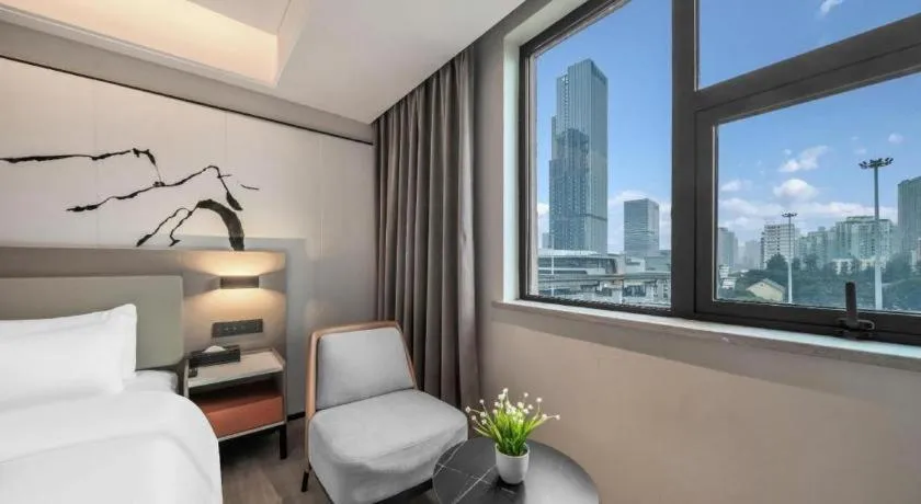 Bed in GreenTree Eastern Chongqing Yangjiaping Pedestrian Street Mixc Hotel