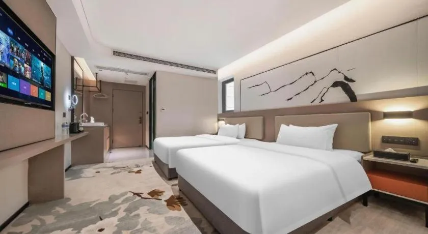 Bed in GreenTree Eastern Chongqing Yangjiaping Pedestrian Street Mixc Hotel