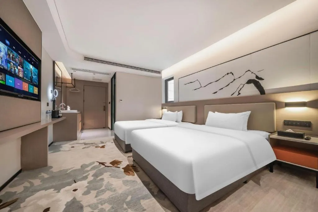 Bed in GreenTree Eastern Chongqing Yangjiaping Pedestrian Street Mixc Hotel
