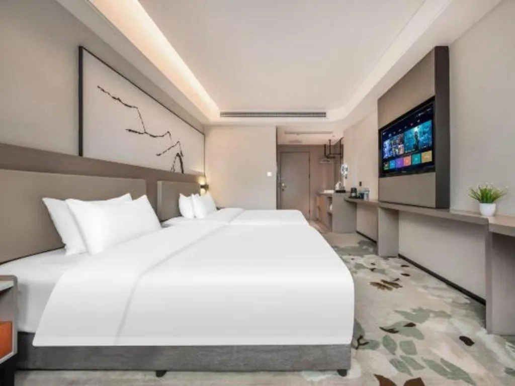 Bed in GreenTree Eastern Chongqing Yangjiaping Pedestrian Street Mixc Hotel