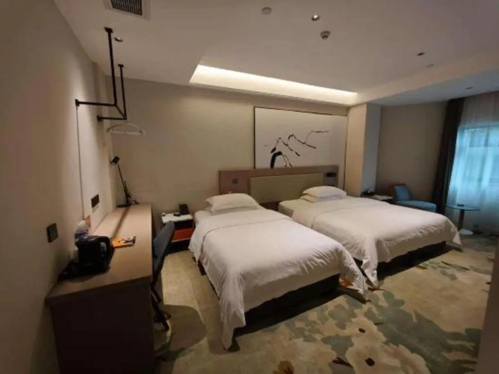 Bed in GreenTree Eastern Chongqing Yangjiaping Pedestrian Street Mixc Hotel