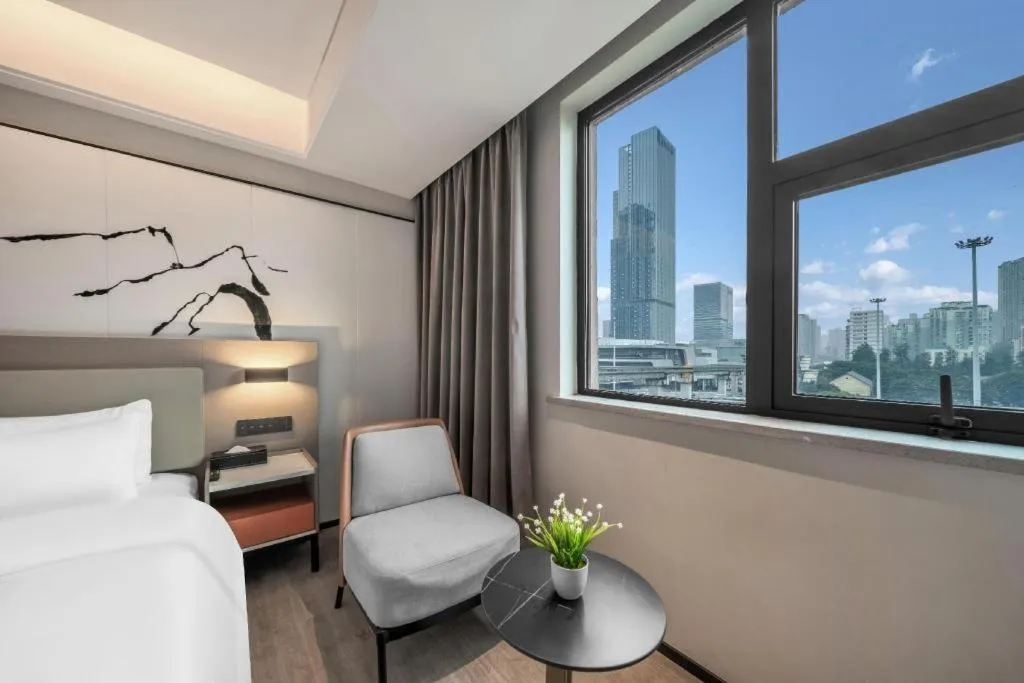 Bed in GreenTree Eastern Chongqing Yangjiaping Pedestrian Street Mixc Hotel