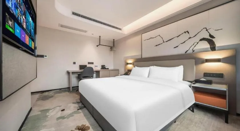 Bed in GreenTree Eastern Chongqing Yangjiaping Pedestrian Street Mixc Hotel