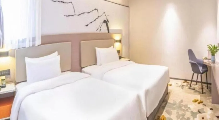 Bed in GreenTree Eastern Chongqing Yangjiaping Pedestrian Street Mixc Hotel