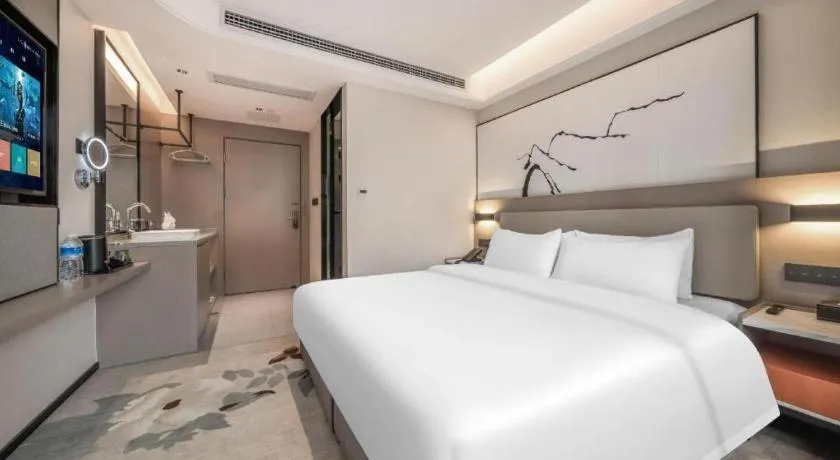 Bed in GreenTree Eastern Chongqing Yangjiaping Pedestrian Street Mixc Hotel
