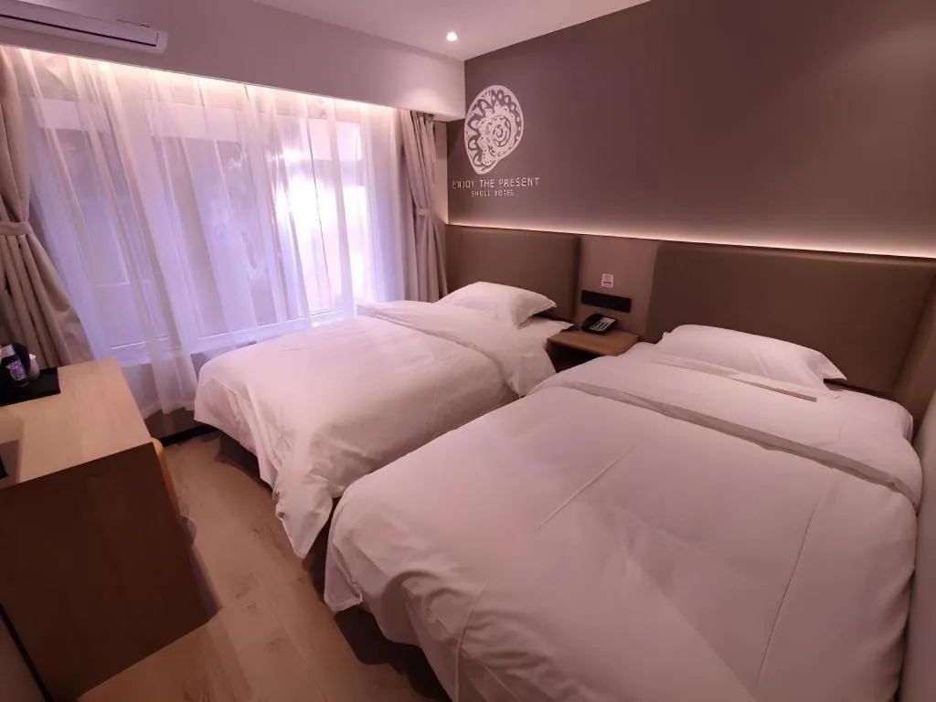 Bed in Shell Hotel Beijing Shunyi District Shunyi Metro Station