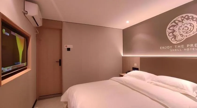 Bed in Shell Hotel Beijing Shunyi District Shunyi Metro Station