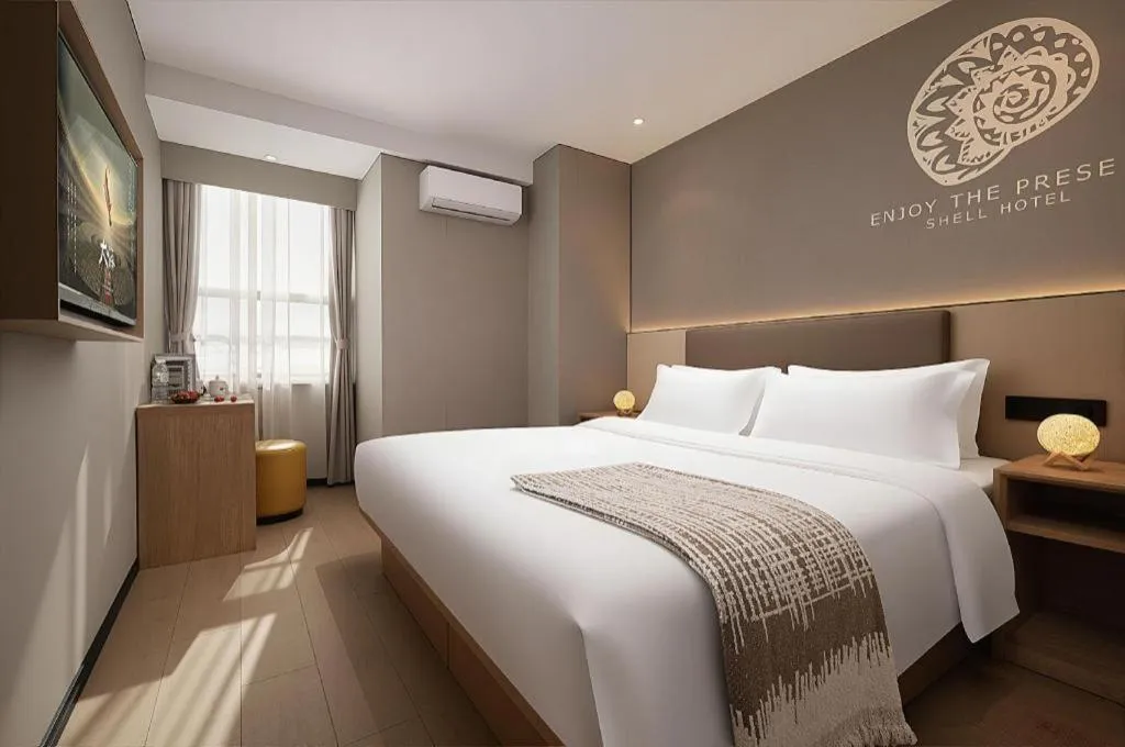 Bed in Shell Hotel Beijing Shunyi District Shunyi Metro Station