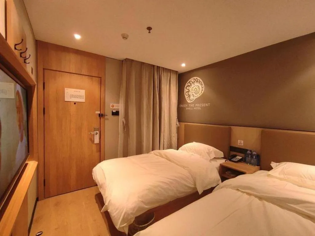 Bed in Shell Hotel Beijing Shunyi District Shunyi Metro Station
