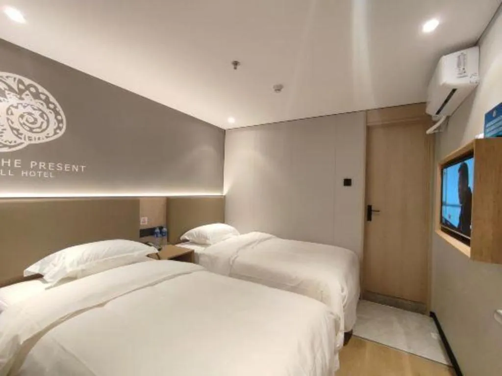 Bed in Shell Hotel Beijing Shunyi District Shunyi Metro Station