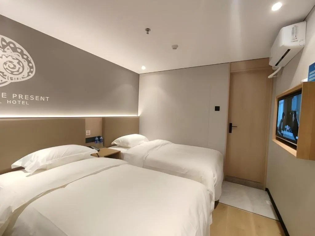 Bed in Shell Hotel Beijing Shunyi District Shunyi Metro Station