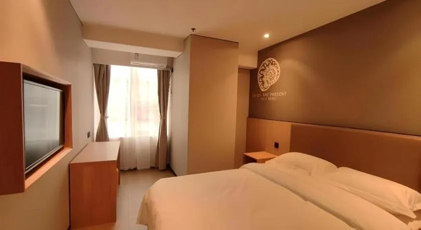 Bed in Shell Hotel Beijing Shunyi District Shunyi Metro Station