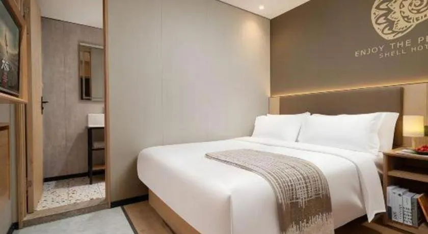 Bed in Shell Hotel Beijing Shunyi District Shunyi Metro Station