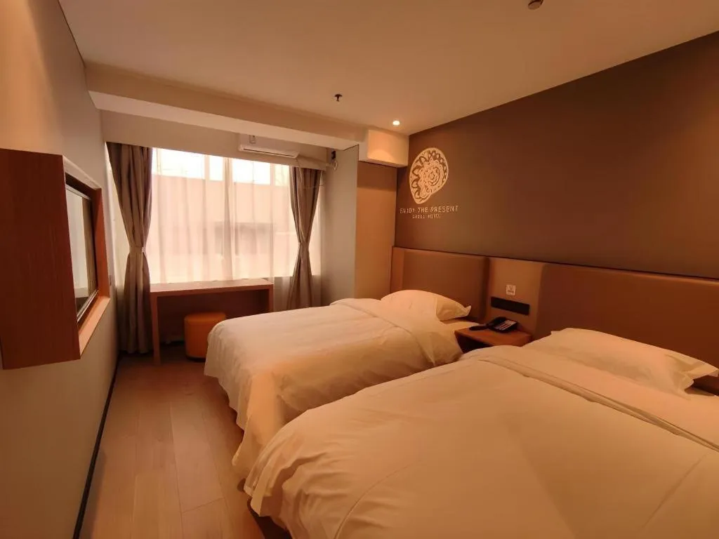 Bed in Shell Hotel Beijing Shunyi District Shunyi Metro Station