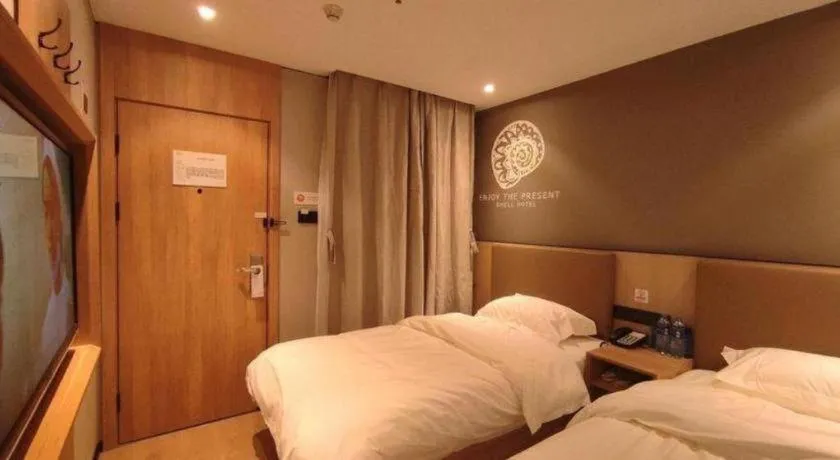 Bed in Shell Hotel Beijing Shunyi District Shunyi Metro Station