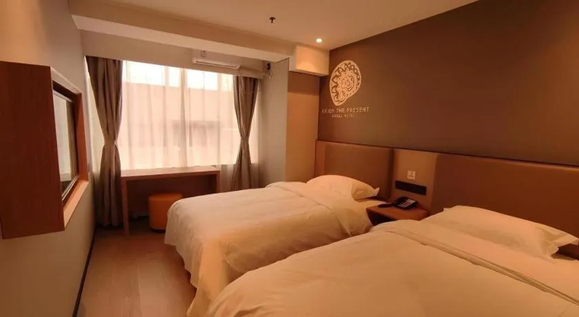 Bed in Shell Hotel Beijing Shunyi District Shunyi Metro Station