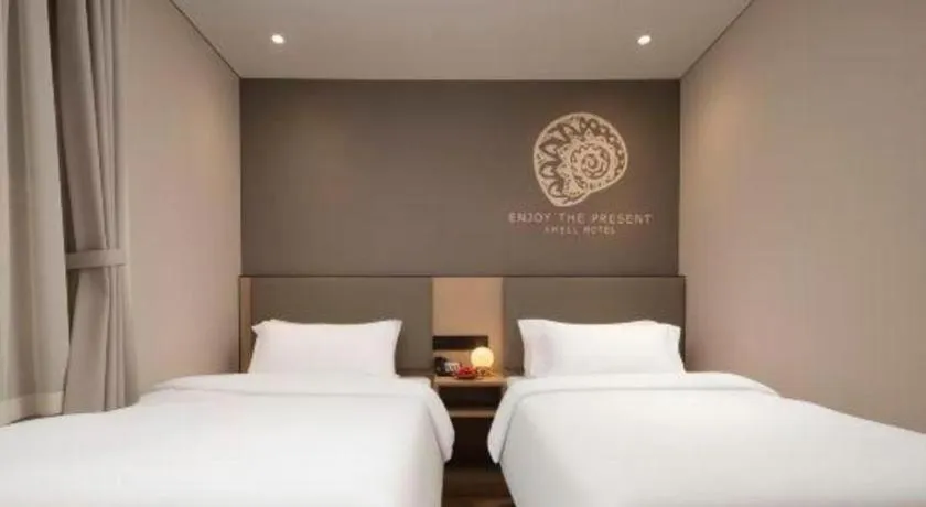 Bed in Shell Hotel Beijing Shunyi District Shunyi Metro Station