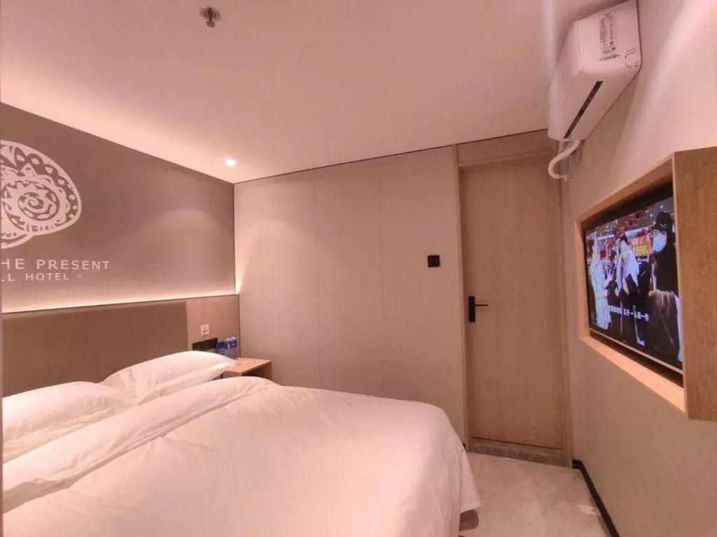 Bed in Shell Hotel Beijing Shunyi District Shunyi Metro Station