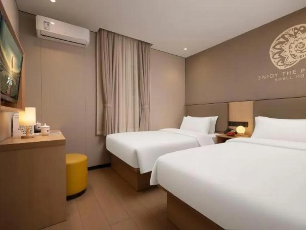 Bed in Shell Hotel Beijing Shunyi District Shunyi Metro Station