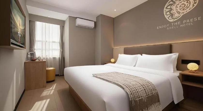 Bed in Shell Hotel Beijing Shunyi District Shunyi Metro Station