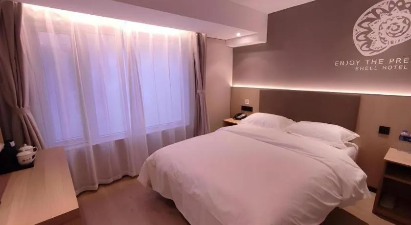 Bed in Shell Hotel Beijing Shunyi District Shunyi Metro Station
