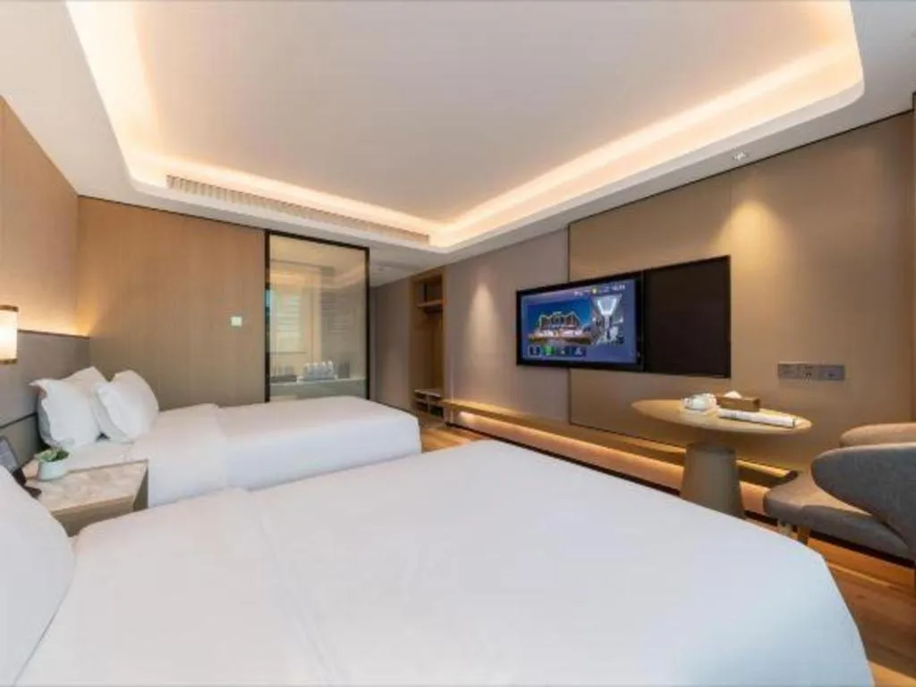 Bed in Gya Hotel Zhuhai International Airport New Town