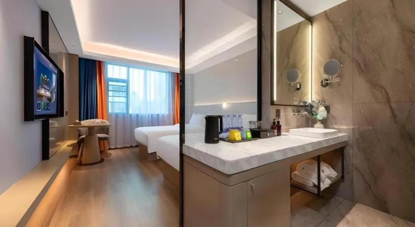 Bed in Gya Hotel Zhuhai International Airport New Town