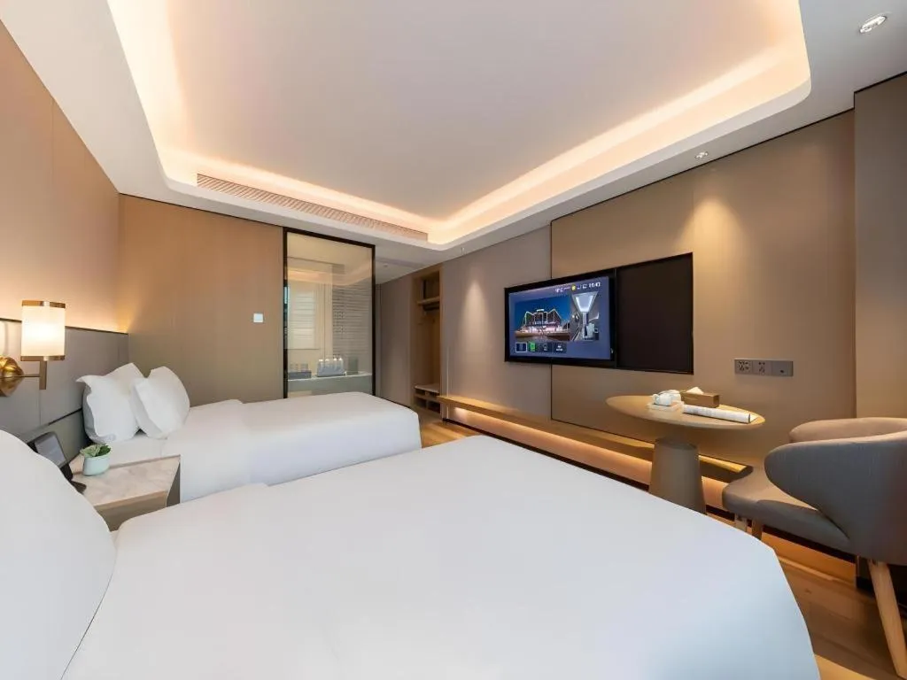Bed in Gya Hotel Zhuhai International Airport New Town