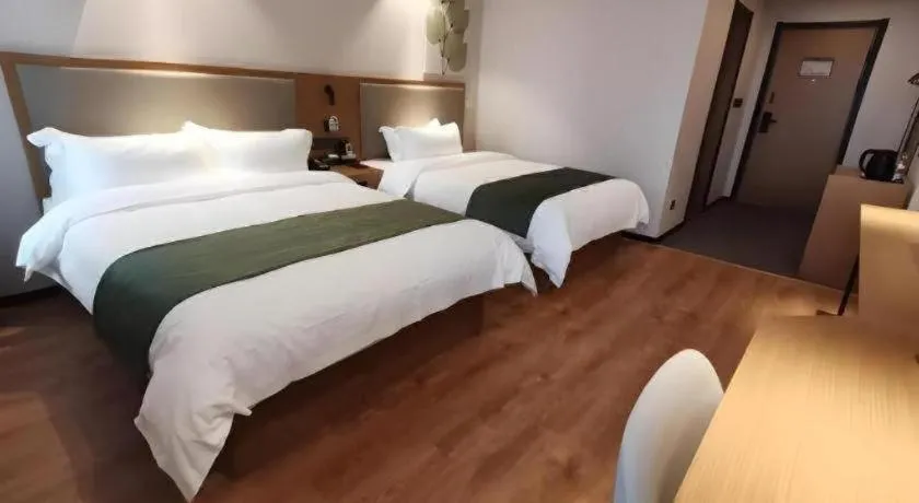 Bed in Green Tree Inn Luoyang Fenghuang Mansion Mudan Square Metro Station