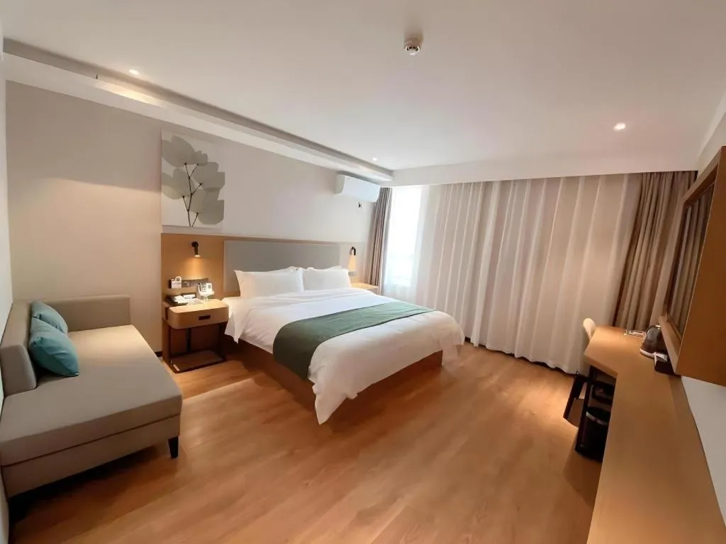 Bed in Green Tree Inn Luoyang Fenghuang Mansion Mudan Square Metro Station