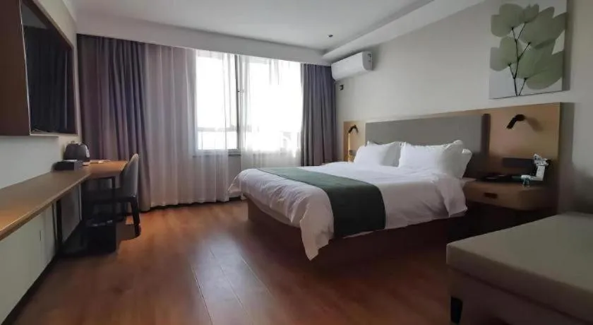 Bed in Green Tree Inn Luoyang Fenghuang Mansion Mudan Square Metro Station