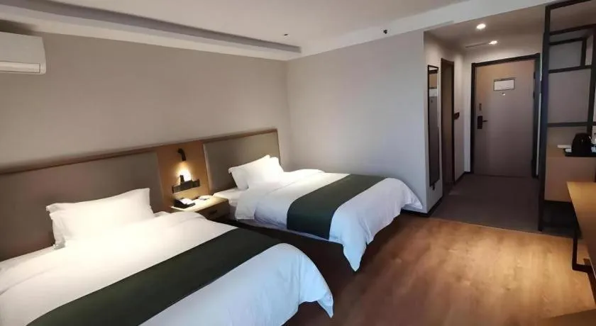 Bed in Green Tree Inn Luoyang Fenghuang Mansion Mudan Square Metro Station