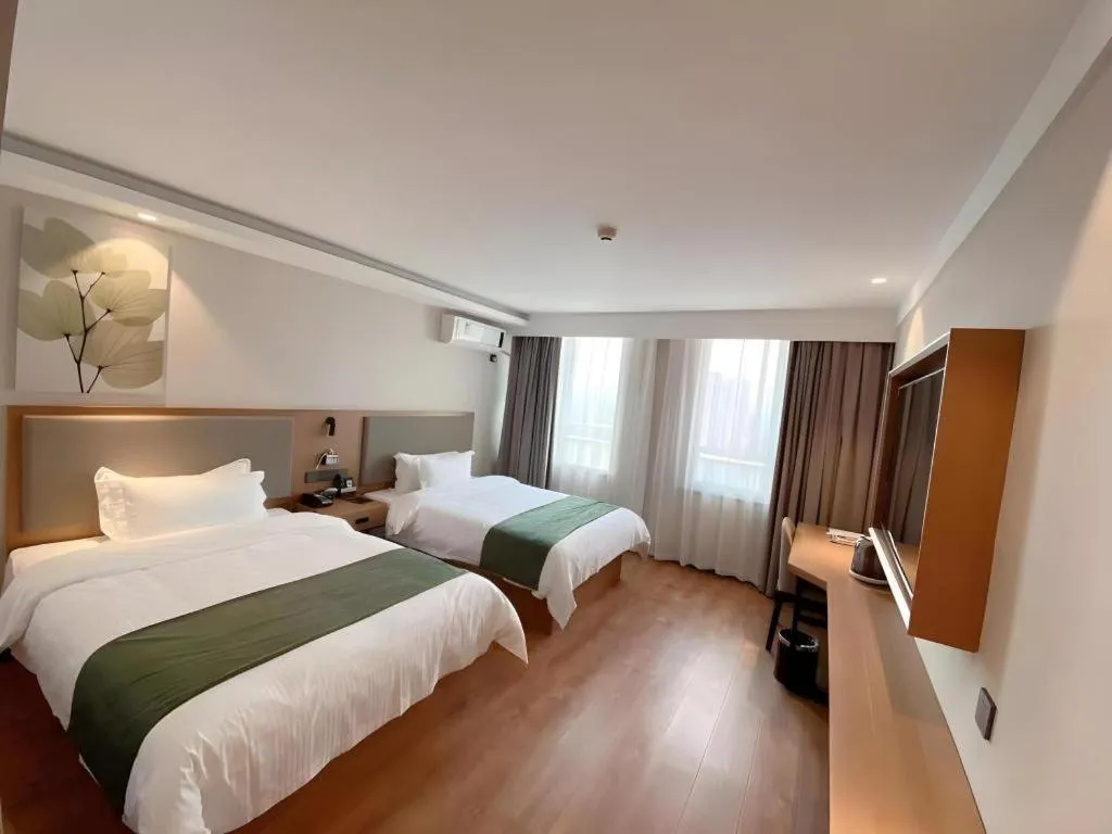 Bed in Green Tree Inn Luoyang Fenghuang Mansion Mudan Square Metro Station