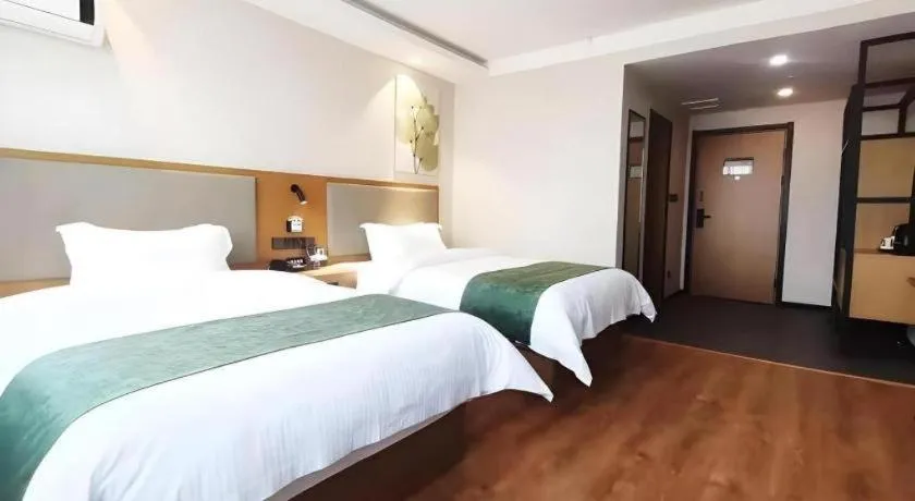 Bed in Green Tree Inn Luoyang Fenghuang Mansion Mudan Square Metro Station