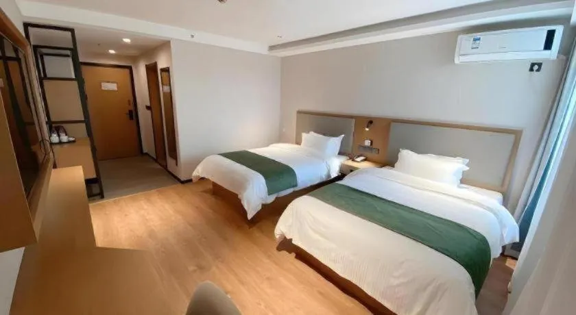 Bed in Green Tree Inn Luoyang Fenghuang Mansion Mudan Square Metro Station