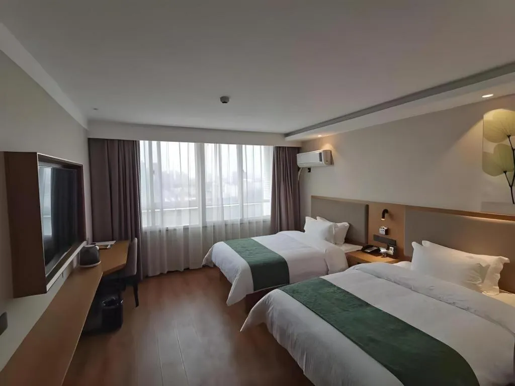 Bed in Green Tree Inn Luoyang Fenghuang Mansion Mudan Square Metro Station