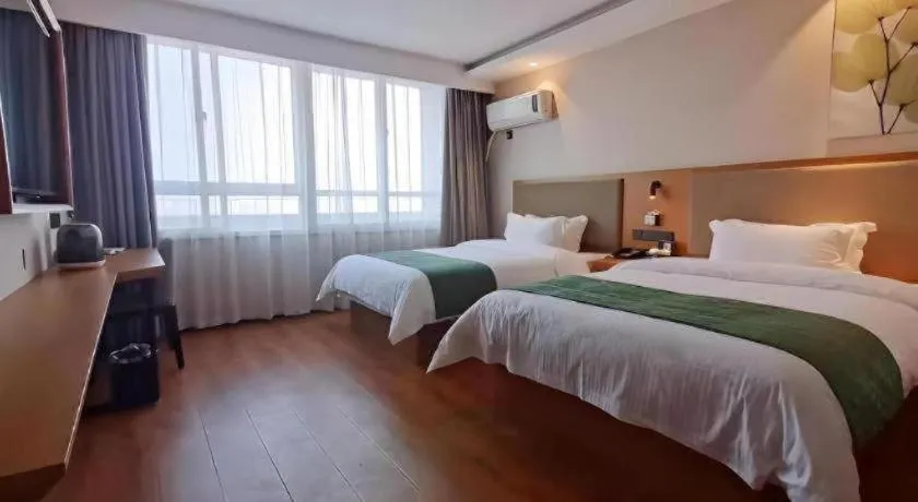 Bed in Green Tree Inn Luoyang Fenghuang Mansion Mudan Square Metro Station
