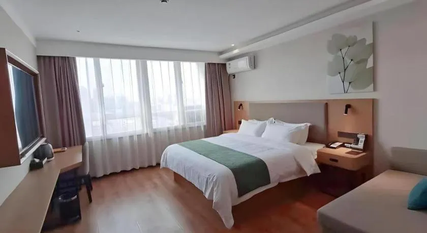 Bed in Green Tree Inn Luoyang Fenghuang Mansion Mudan Square Metro Station
