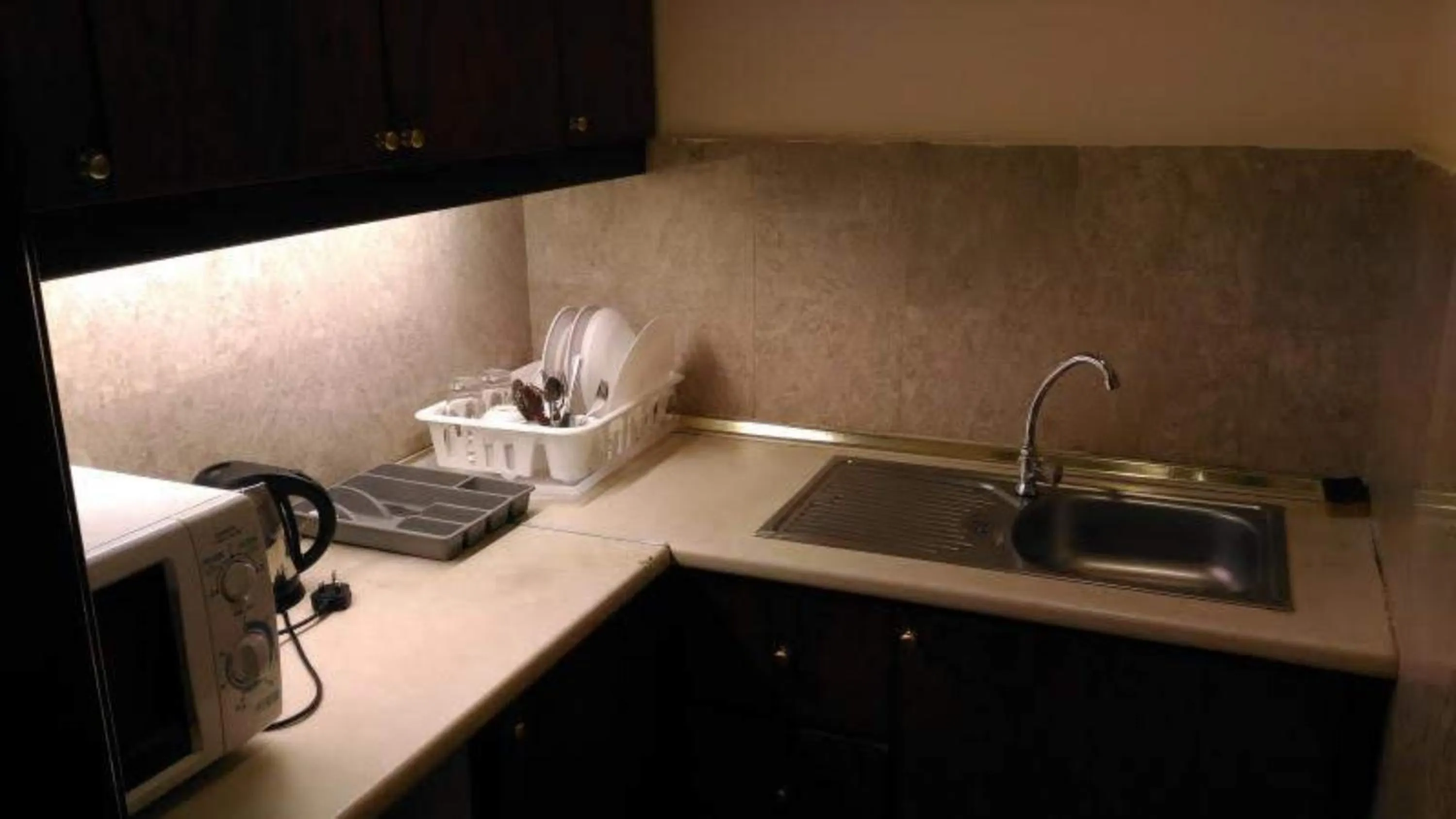 Kitchen or kitchenette in EMAS Service Suite Times Square