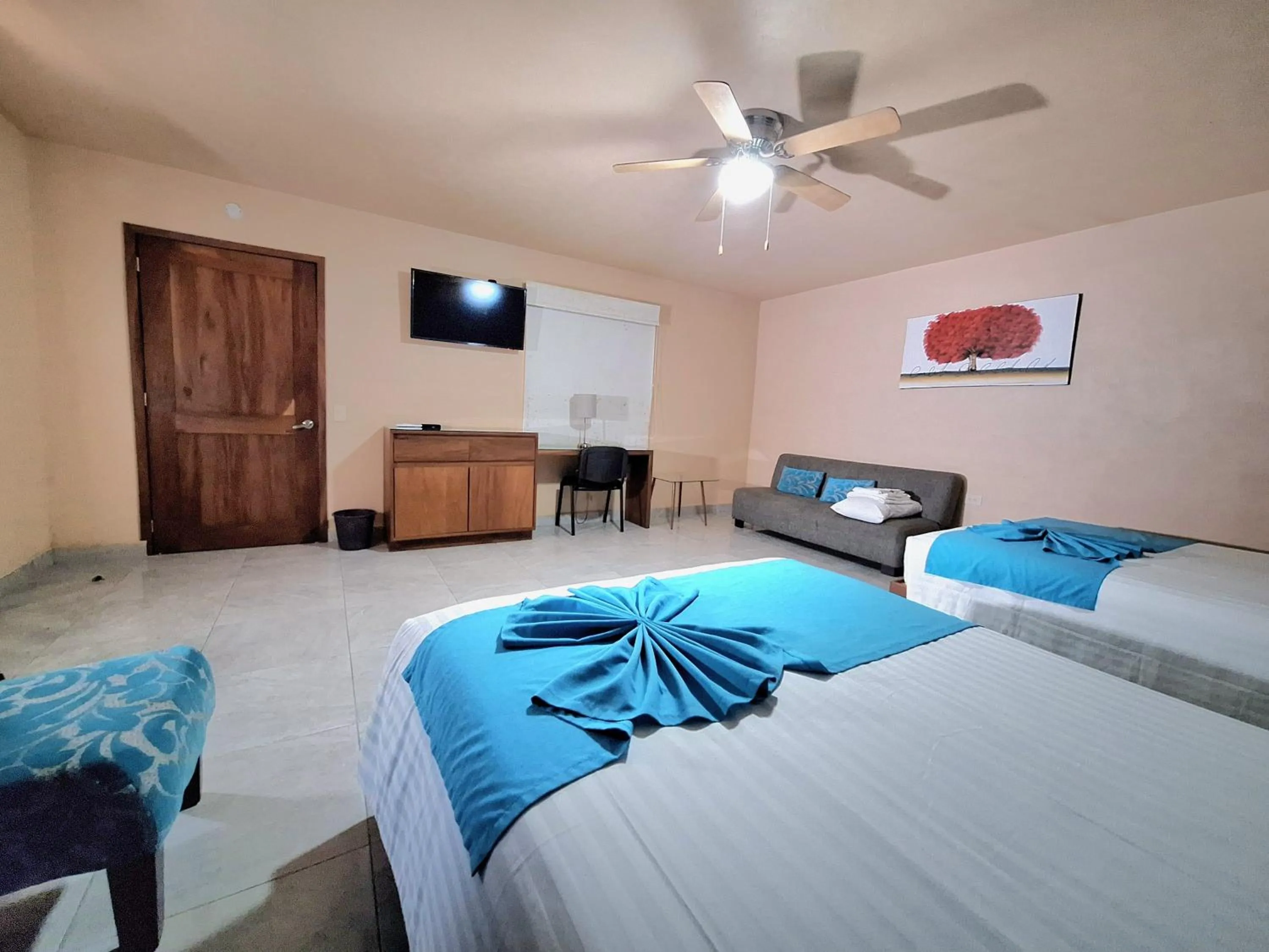 Bed in Pacific Inn hotel