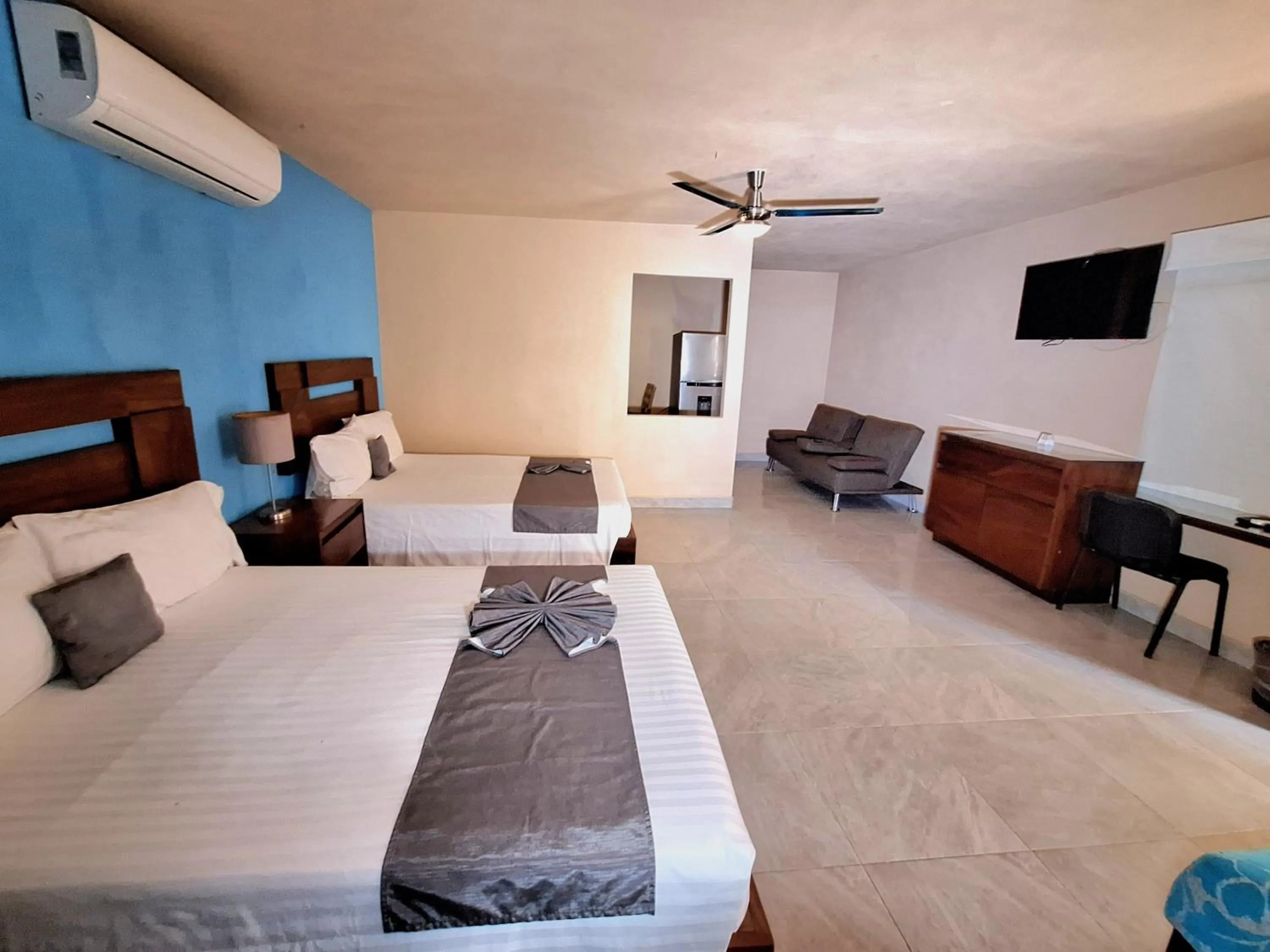 Bed in Pacific Inn hotel